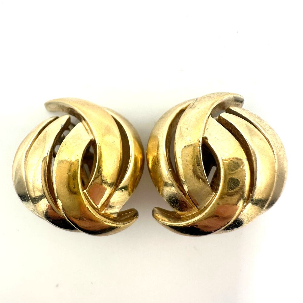 Panetta signed vintage signed gold tone domed abstract leaf clip on earrings